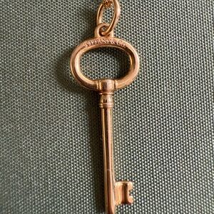 Tiffany & Co. 18k gold oval key necklace with 16”chain